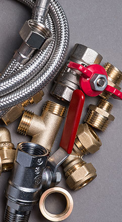 Professional plumbing tools used for repairs and maintenance including valves and pipe fittings